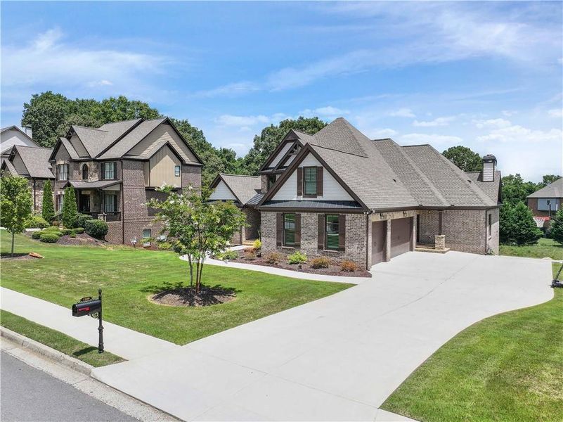 Front exterior of a new home in , Auburn, GA, highlighting curb appeal (Image 22).