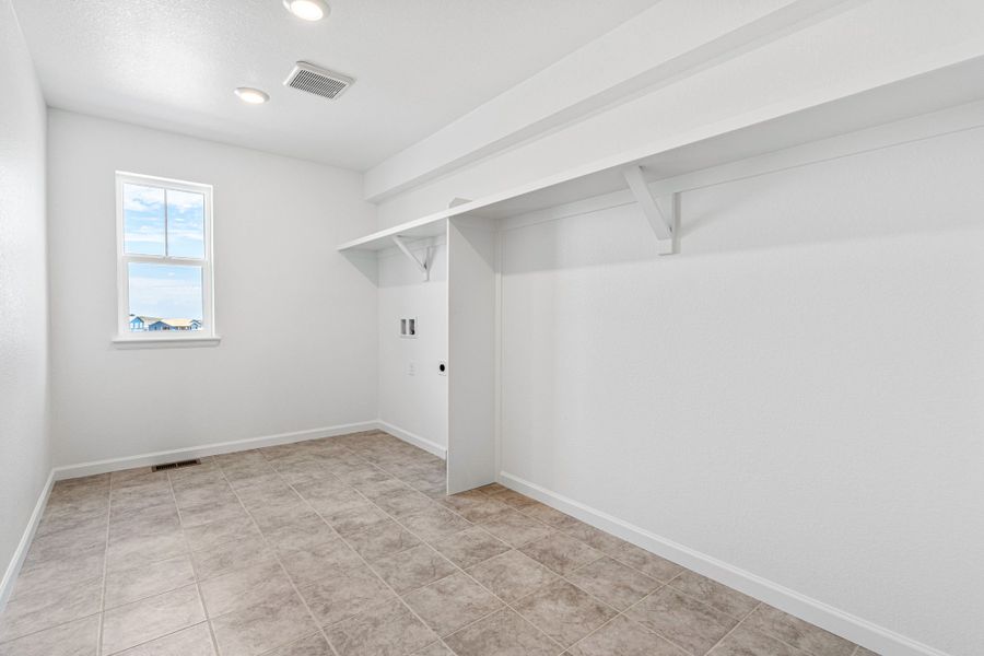 Representative unfurnished interior of a home built from the Eagle by Taylor Morrison in The Town Collection at Independence, Elizabeth (Image 18).