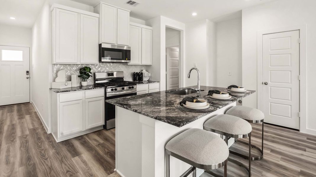 Representative furnished interior of a home built from the Hibiscus by D.R. Horton in Legacy Village, Houston (Image 6). Representative furnished interior of a home built from the Hibiscus by D.R. Horton in Legacy Village, Houston (Image 6).