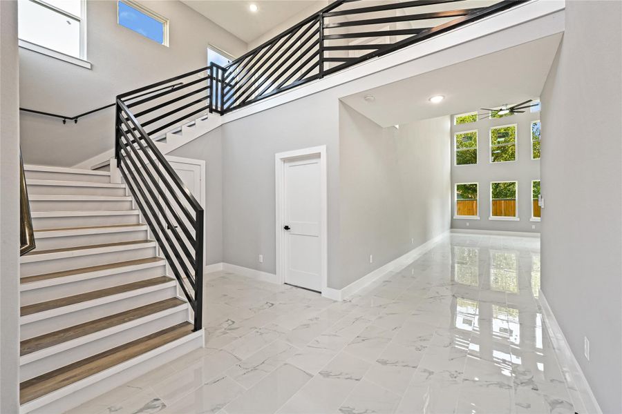 Ceramic tiles whole first floor, bathrooms and utility