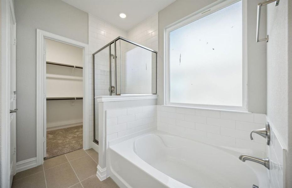 Oversized tub in owner's bath*real home pictured