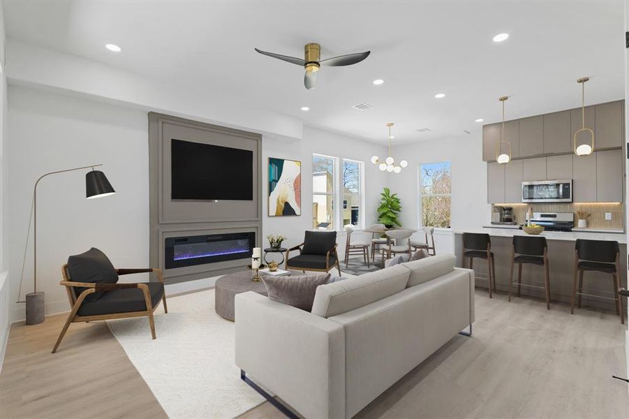 Virtually Staged: Fantastic open layout between the living room, breakfast space and kitchen.