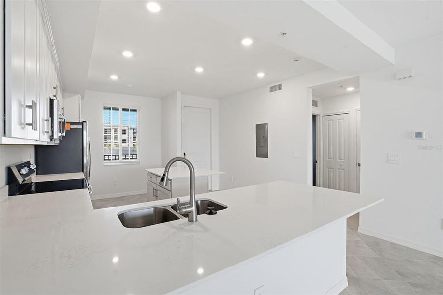 Furnished interior view inside a new home in Wellen Park Golf & Country Club, Venice (Image 6).