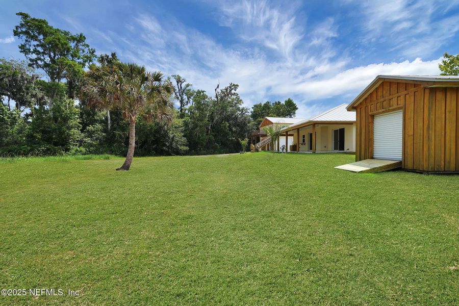 Front exterior of a new home in , East Palatka, FL, highlighting curb appeal (Image 40). Front exterior of a new home in , East Palatka, FL, highlighting curb appeal (Image 40).