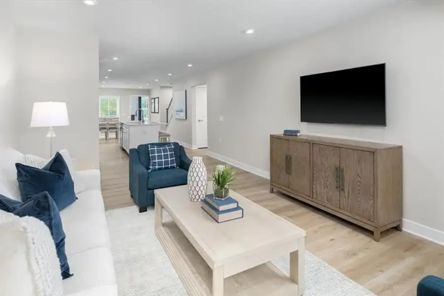 Representative furnished interior of a home built from the Nassau Cove - 3253 Edgehill Drive by Ryan Homes in Lakes at Riverbend, Navassa (Image 10).