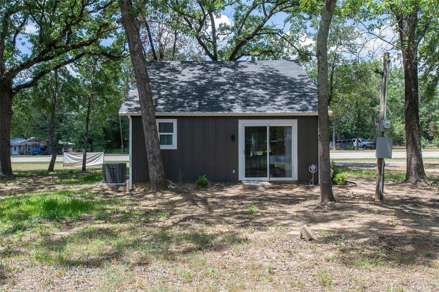 Front exterior of a new home in , Log Cabin, TX, highlighting curb appeal (Image 25).