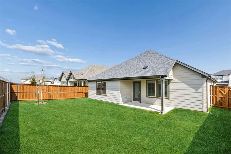 Patio in the Oscar home plan by Trophy Signature Homes – REPRESENTATIVE PHOTO Patio in the Oscar home plan by Trophy Signature Homes – REPRESENTATIVE PHOTO
