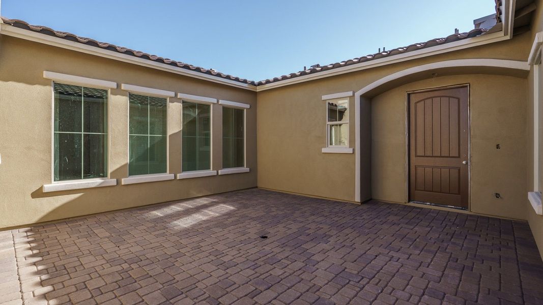 Exterior details and patio area of a home in Harmony at Montecito in Estrella, Goodyear (Image 3).