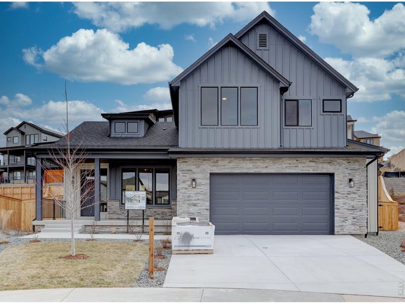Front exterior of a new home in , Louisville, CO, highlighting curb appeal (Image 1). Front exterior of a new home in , Louisville, CO, highlighting curb appeal (Image 1).
