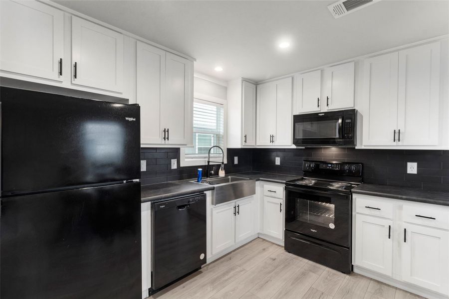 Furnished interior view inside a new home in , Pearland (Image 6).