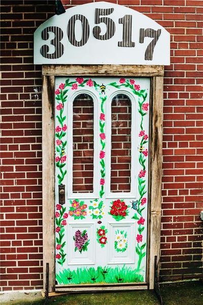 Front exterior of a new home in Rosewood Lake Estates, Hoschton, GA, highlighting curb appeal (Image 55).