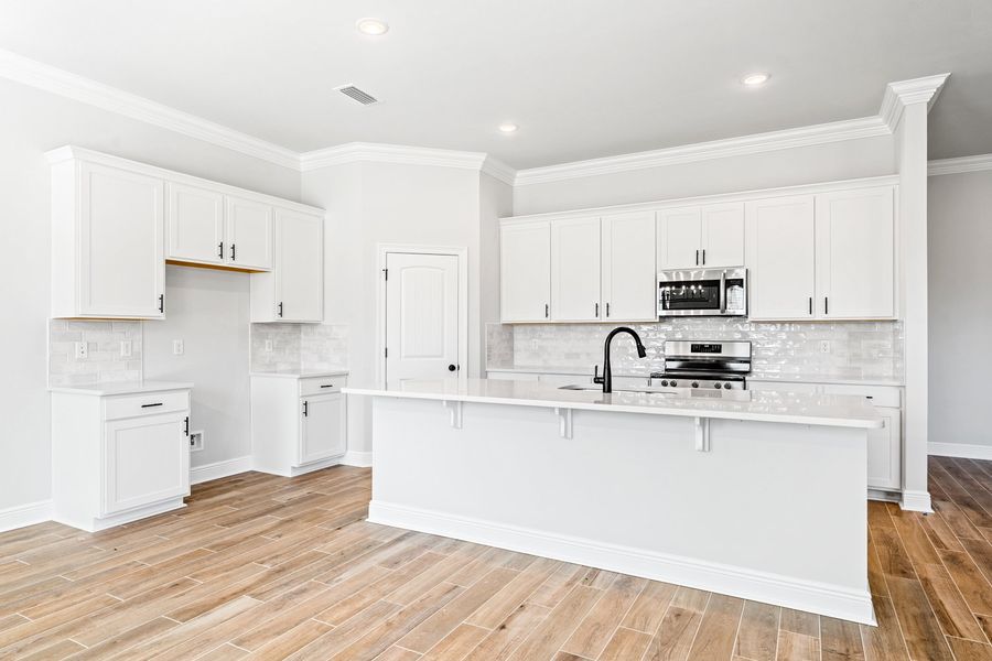 Furnished interior view inside a new home in Natureview, Freeport (Image 5).