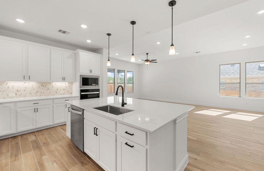 Furnished interior view inside a new home in West Cypress Hills, Spicewood (Image 5).
