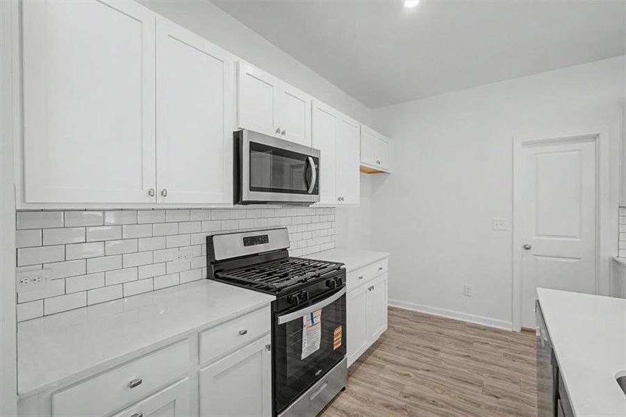 Furnished interior view inside a new home in Sawmill Creek, Mableton (Image 9).