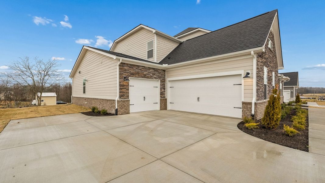 Representative exterior photo of a completed home built from the Tisdale by D.R. Horton in Harvest Point, Spring Hill, TN (Image 29). Representative exterior photo of a completed home built from the Tisdale by D.R. Horton in Harvest Point, Spring Hill, TN (Image 29).