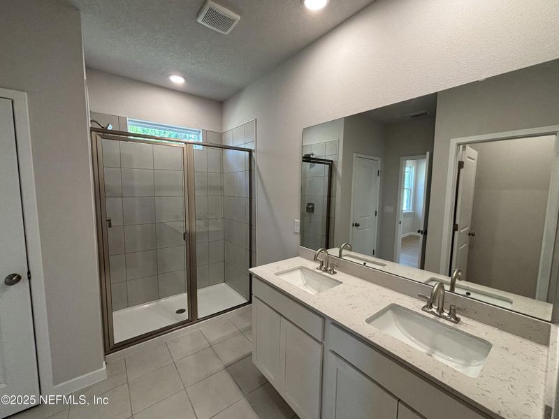 Furnished interior view inside a new home in The Magnolia Series at Reserve East, Flagler Beach (Image 10).