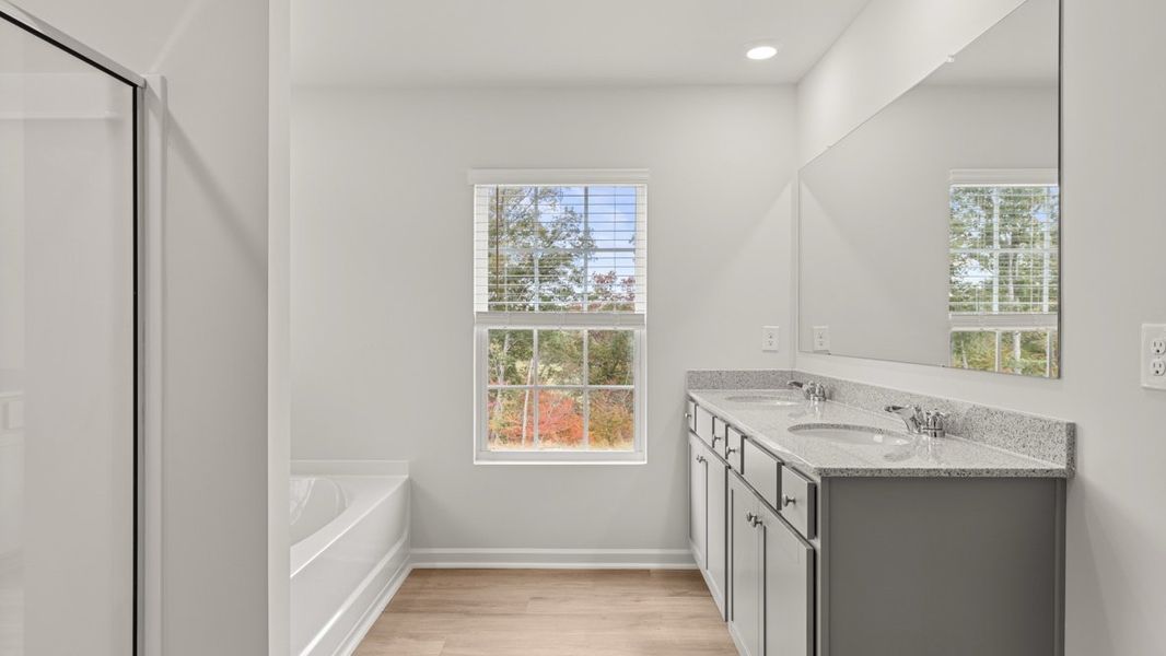 Representative furnished interior of a home built from the HALTON by D.R. Horton in Lost Creek, Dallas (Image 11).