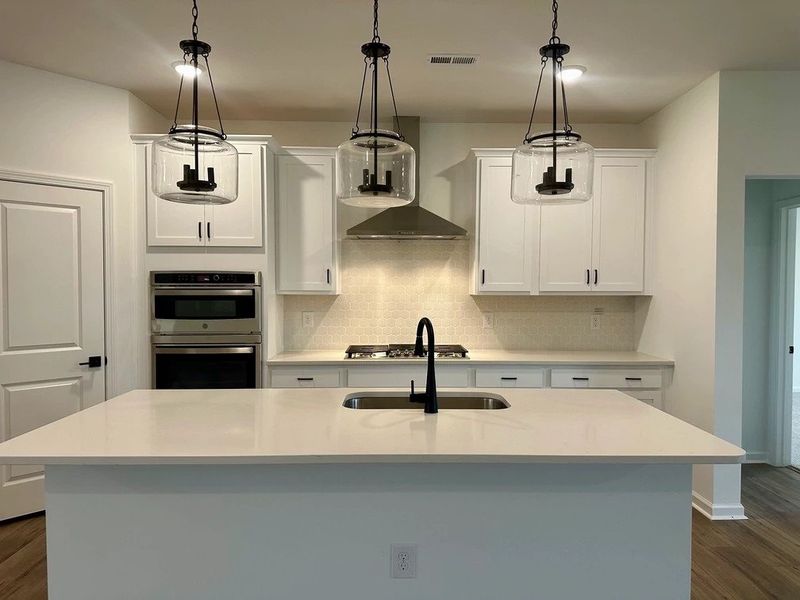 Kitchen featuring the AW Collection® Harmony - Smooth finishes and classic touches shine. Kitchen featuring the AW Collection® Harmony - Smooth finishes and classic touches shine.