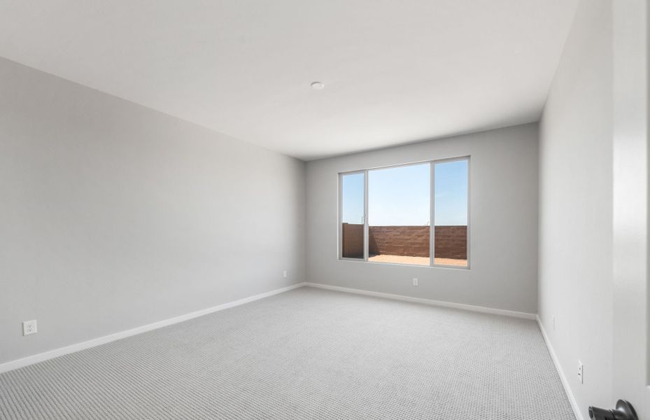 Spacious, unfurnished interior of a new home in Soleo, San Tan Valley (Image 22).
