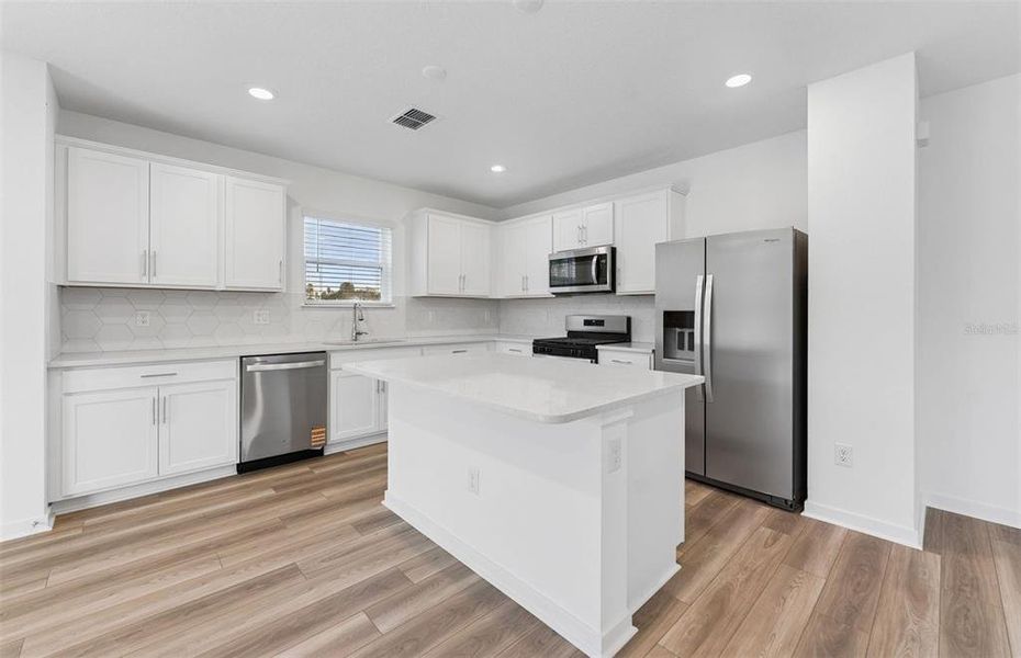 Furnished interior view inside a new home in Riverwood, Zephyrhills (Image 4).