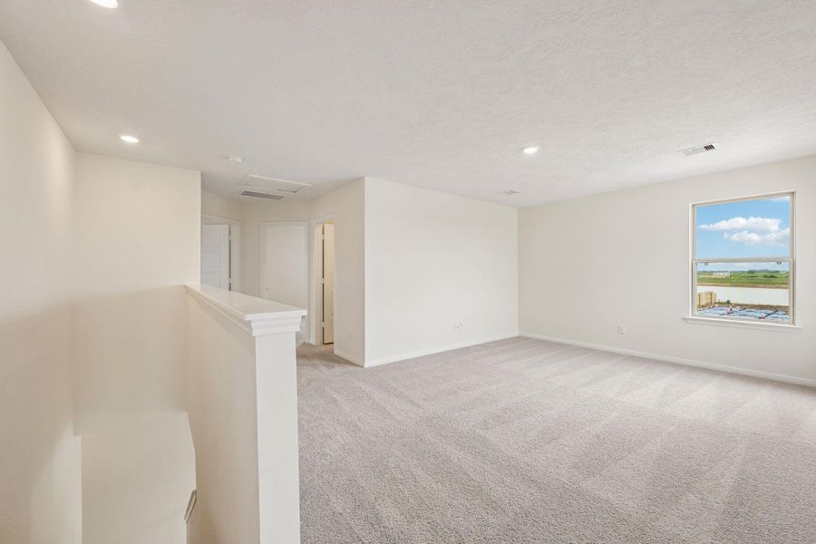 Head upstairs and enjoy the Loft—an additional living area perfect for a game room, media space, or a peaceful retreat.