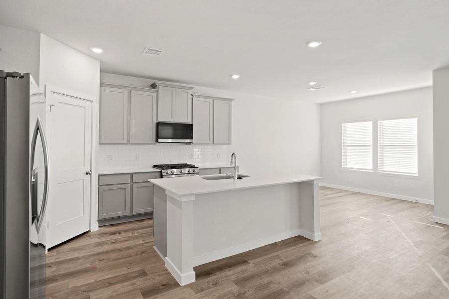 Furnished interior view inside a new home in Woodshore, Clute (Image 13).