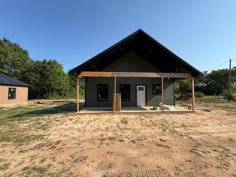 Bungalow-style house featuring a patio