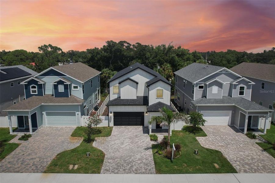 Front exterior of a new home in , St. Petersburg, FL, highlighting curb appeal (Image 2). Front exterior of a new home in , St. Petersburg, FL, highlighting curb appeal (Image 2).