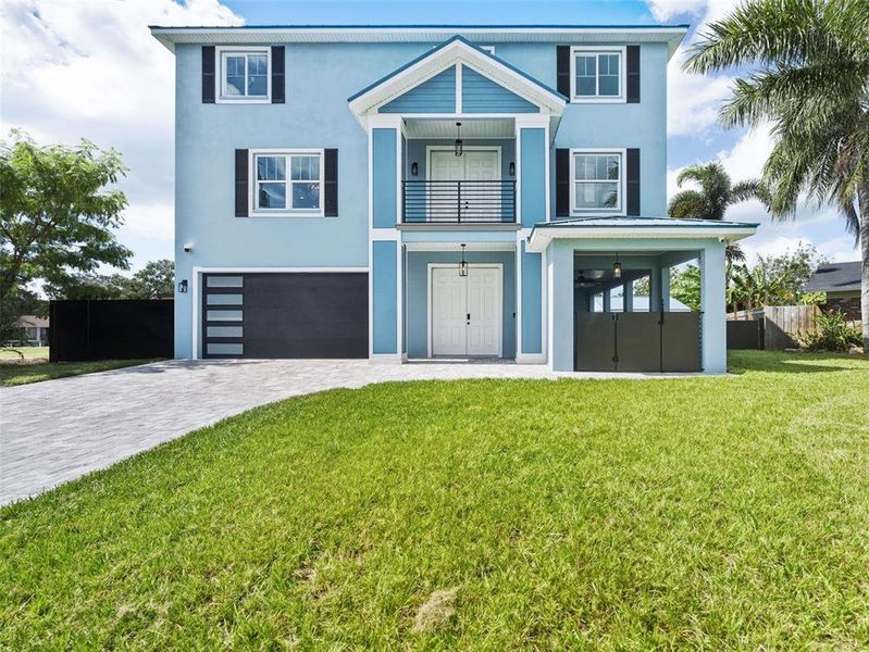 Front exterior of a new home in , Tampa, FL, highlighting curb appeal (Image 31). Front exterior of a new home in , Tampa, FL, highlighting curb appeal (Image 31).