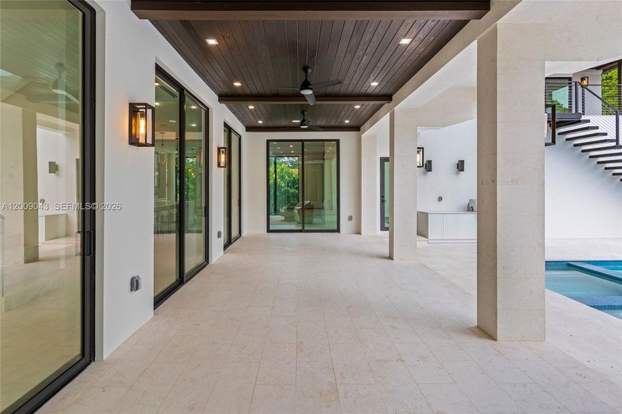 Exterior details and patio area of a home in , Coral Gables (Image 30).