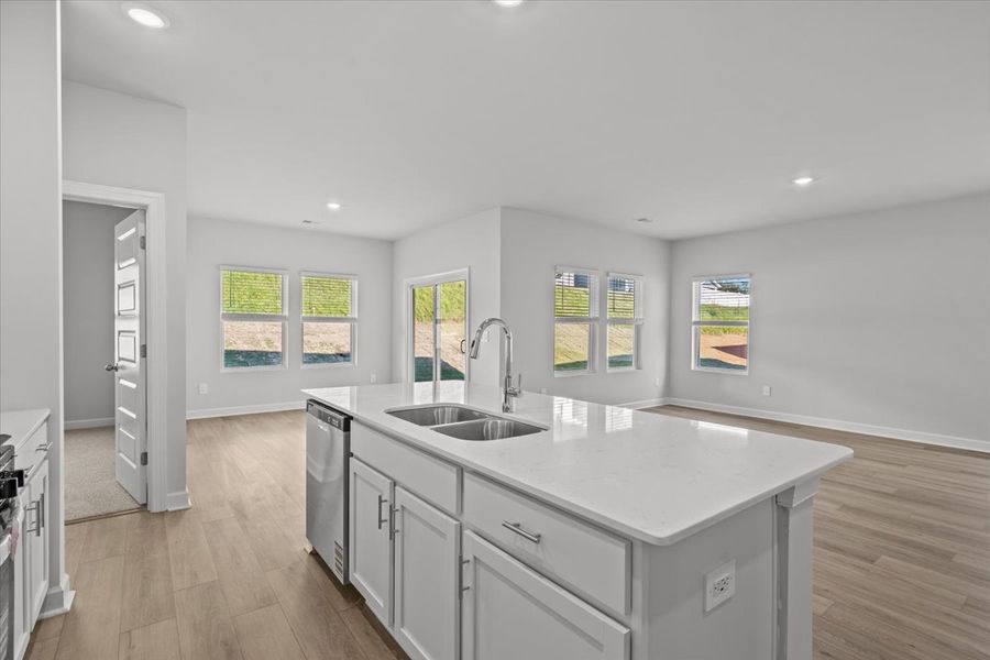 Furnished interior view inside a new home in The Farm at Wells Creek - Signature Collection, Gray Court (Image 7).