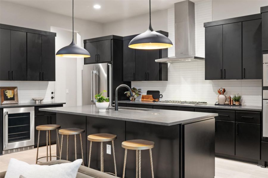 Culinary excellence awaits in this well-appointed kitchen with an oversized island for gathering. Culinary excellence awaits in this well-appointed kitchen with an oversized island for gathering.