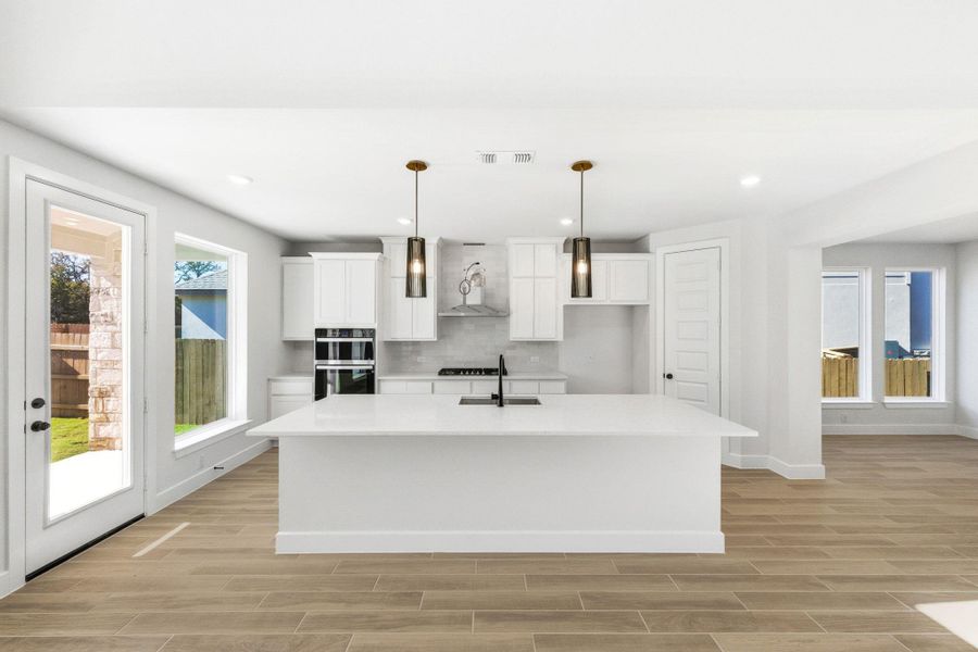 Furnished interior view inside a new home in The Colony, Bastrop (Image 7).