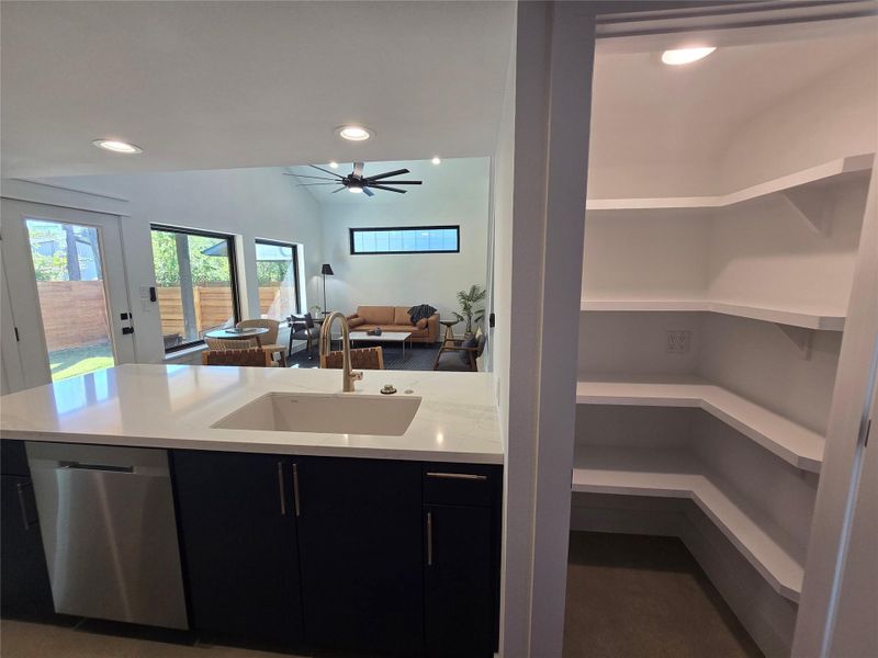 Walk in pantry to store LOTS of things, also has multiple electrical outlets to allow you to leave things plugged in and charging while out of sight. Walk in pantry to store LOTS of things, also has multiple electrical outlets to allow you to leave things plugged in and charging while out of sight.