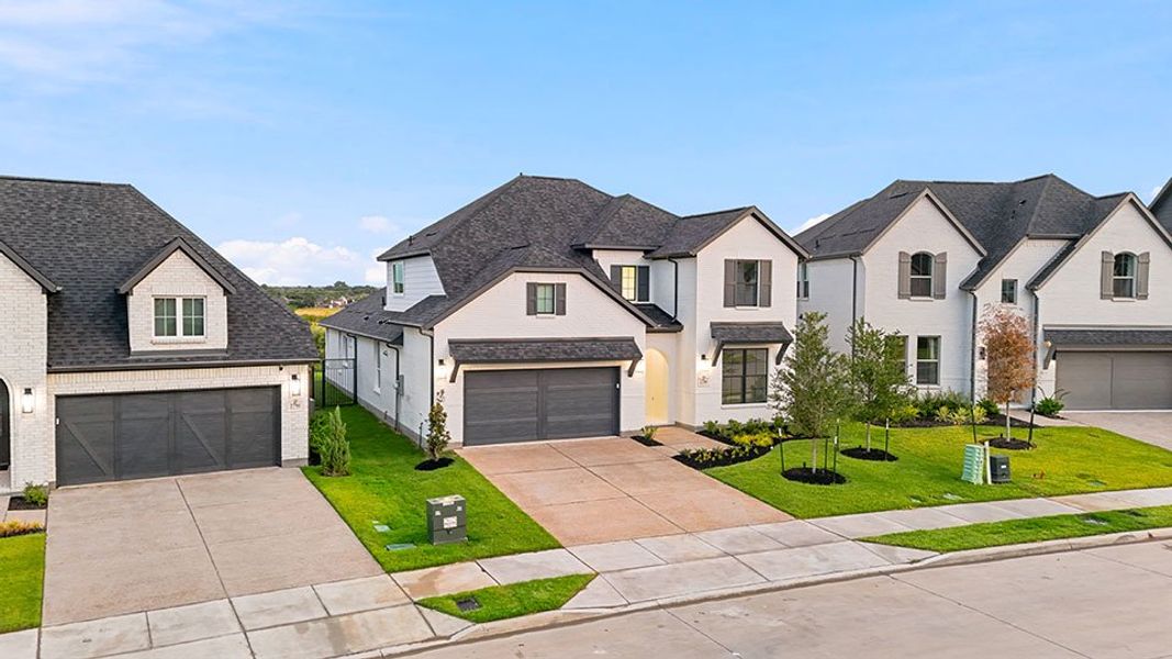 Front exterior of a new home in Brookhollow West, Prosper, TX, highlighting curb appeal (Image 27).