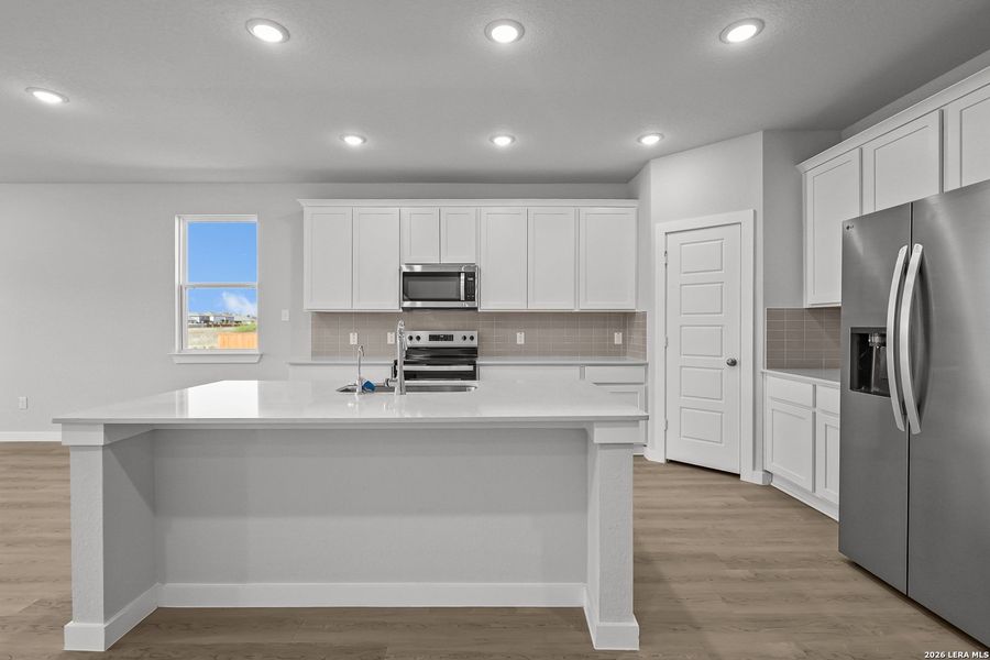 Furnished interior view inside a new home in Cinco Lakes, San Antonio (Image 15).