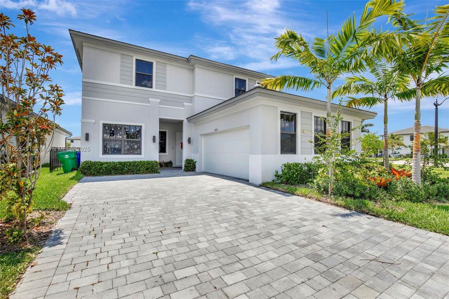 Front exterior of a new home in , Miramar, FL, highlighting curb appeal (Image 21).
