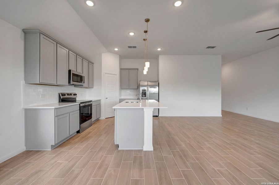 Furnished interior view inside a new home in Chaparral Ranch, Floresville (Image 8).