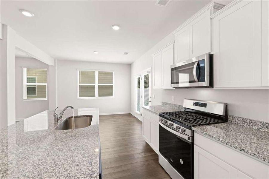 Furnished interior view inside a new home in Oakchase at Hampton, Hampton (Image 6).