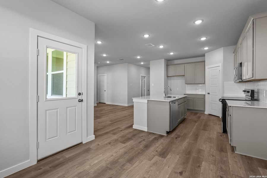 Furnished interior view inside a new home in Cinco Lakes, San Antonio (Image 6).
