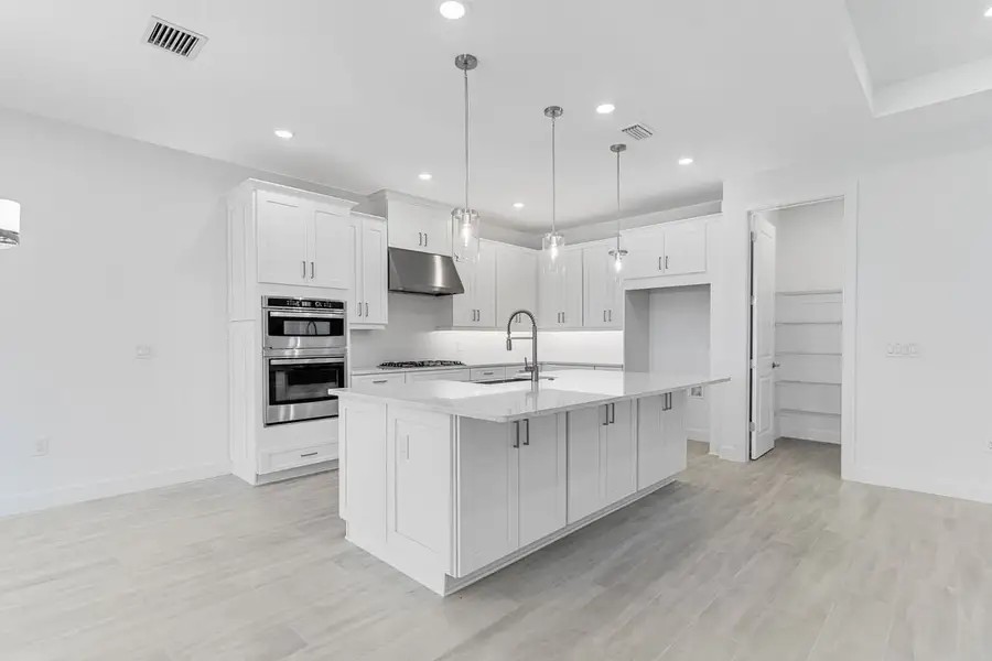 Representative furnished interior of a home built from the Azzurro by Taylor Morrison in Esplanade at Center Lake Ranch, St. Cloud (Image 6).