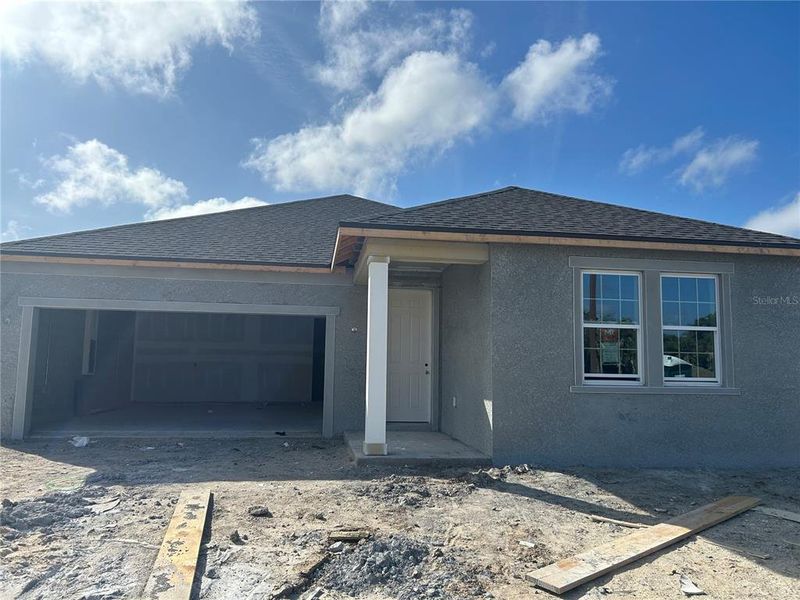 In-progress construction of a new home in Oakfield Trails, Parrish, FL (Image 12).