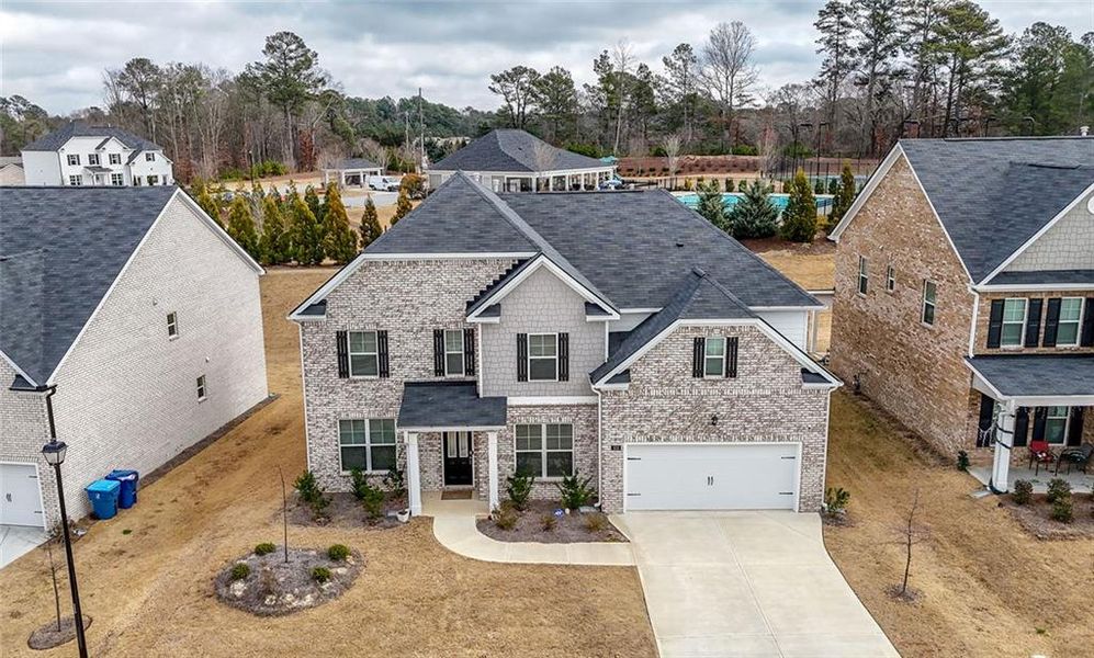 Front exterior of a new home in Water Oak Estates, Lawrenceville, GA, highlighting curb appeal (Image 27).