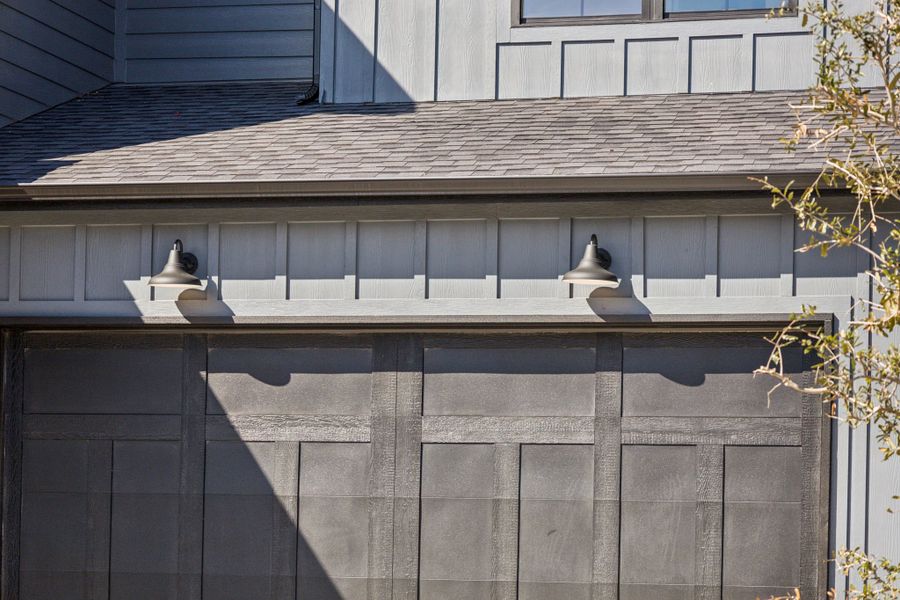 Front exterior of a new home in , Dallas, TX, highlighting curb appeal (Image 23).