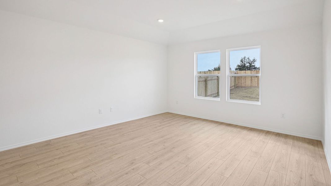 Spacious, unfurnished interior of a new home in Carillon, Manor (Image 22).