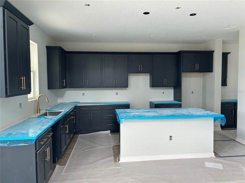 In-progress construction of a new home in Oakfield Trails Signature, Parrish, FL (Image 28).