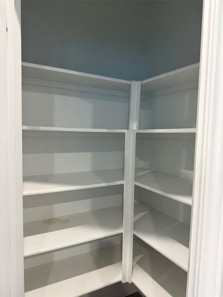 Ample built-in shelving provides generous storage space.