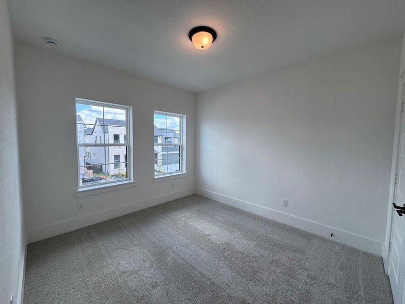 Spacious, unfurnished interior of a new home in Easthaven at Bridgeland Central - Vision Collection, Cypress (Image 14).