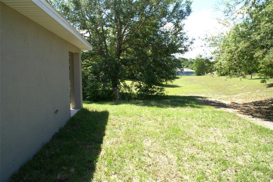 Exterior details and patio area of a home in , Ocala (Image 19).