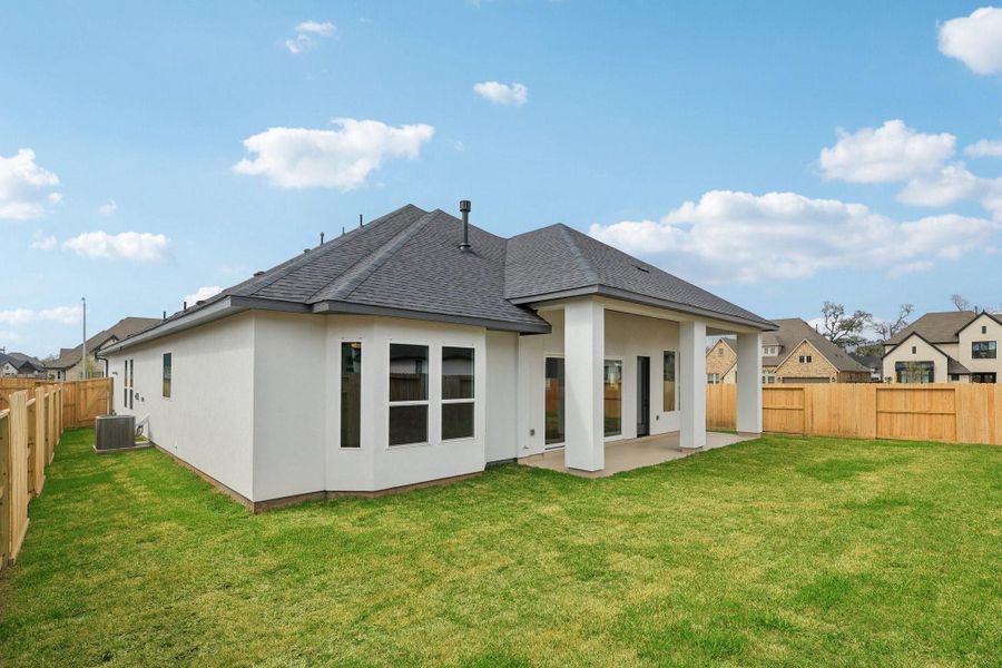 Exterior details and patio area of a home in Sienna 65', Missouri City (Image 20).